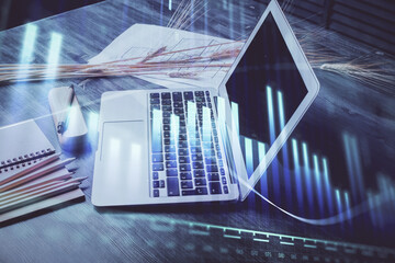 Poster - Stock market graph on background with desk and personal computer. Multi exposure. Concept of financial analysis.