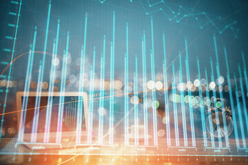 Poster - Stock market graph on background with desk and personal computer. Multi exposure. Concept of financial analysis.