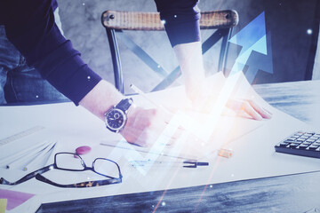 Poster - Businessman with creative business upward arrows on people hands background. Financial growth concept. Double exposure
