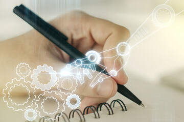 Aufkleber - Double exposure of robotics technology hologram and man hand writing in notebook on background. Research and development software concept