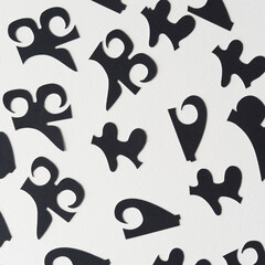 Sticker - abstract black cutout shapes on white