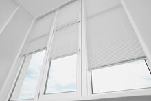 Stylish Window With Horizontal Blinds In Room, Low Angle View