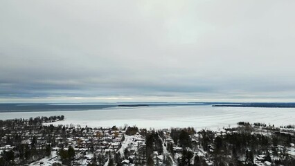 Wall Mural - Downtown barrie drone views centennial beach winter time ice snow on lake simcoe