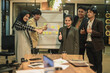 © Queenmoonlite Studio - Group of business worker showing thumbs up