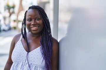 African american woman smiling confident standing at street