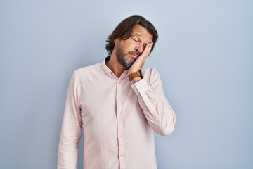 Sticker - Handsome middle age man wearing elegant shirt background thinking looking tired and bored with depression problems with crossed arms.