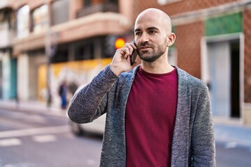 Sticker - Young man talking on the smartphone at street