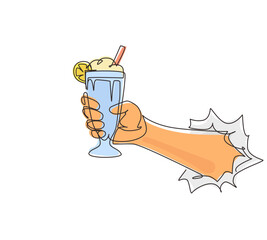 Poster - Single one line drawing hand holds glass milkshake with whipped cream through torn white paper. Cold soft drink for summer. Sweet beverage. Tasty and yummy fast food continuous line draw design vector