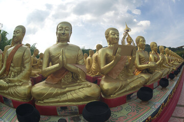 Wall Mural - Phuttha Utthayan Makha Bucha Anusorn(Buddhism Memorial Park),It is a Dharma garden that simulates the events of Makha Bucha Day when the Lord Buddha preached the Patimokkha sermon.Among the1,250 monks