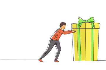 Poster - Single continuous line drawing young man pushes in front of him huge gift . Giving gifts for holiday concept. Wrapped birthday gift box with bow. Present, gift, birthday. One line draw design vector