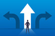 Choice and decision, businessman standing with arrows in three different directions, pathway selection dilemma