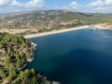 Aerial View On Freshwater Lake With Dam For Irrigation And Drinking In Centre Of Dry, Sunny Cyprus Island