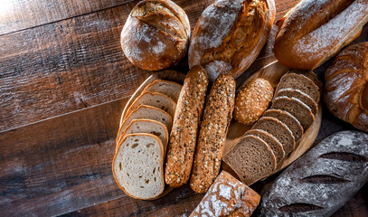 Wall Mural - Assorted bakery products including loafs of bread and rolls