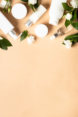 Wall Mural - natural cosmetic products with green leaves and flowers.