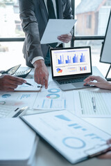 Wall Mural - Team of businesspeople working with chart of accounts (COA) and balance sheet, stock market data, consulting asset accounts record any resources of company, anti bribery, error checking concept