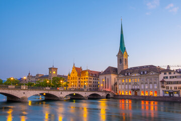 Scenic panoramic view of historic Zürich city center with famous Fraumünster and Grossmünster Church and river Limmat at Lake Zurich on a beautiful sunny day with blue sky in summer, Switzerland