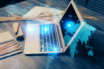 Aufkleber - Computer on desktop with social network hologram. Double exposure. Concept of international people connections.