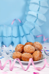 Wall Mural - Small German traditional 'Berliner Pfannkuchen', a donut without hole filled with jam. Traditional served during carnival