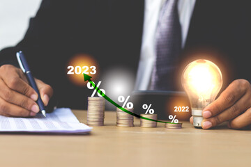 Wall Mural - Interest rate and dividend concept, businessman calculating income and return on investment, save, income, return, retirement, compensation fund, investment, dividend tax, stock market, saving, trade.