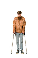 Adult man with crutches full body isolated