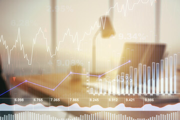 Poster - Multi exposure of abstract financial graph on laptop background, financial and trading concept