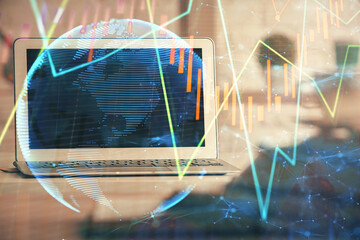 Poster - Double exposure of chart and financial info and work space with computer background. Concept of international online trading.