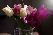 Bouquet Of Tulips In A Vase In A Room