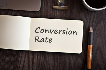 Poster - there is notebook with the word conversion rate. it is an eye-catching image.