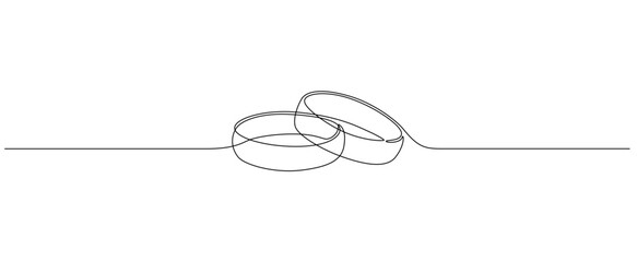 one continuous line drawing of wedding rings. romantic elegance concept and symbol proposal engageme