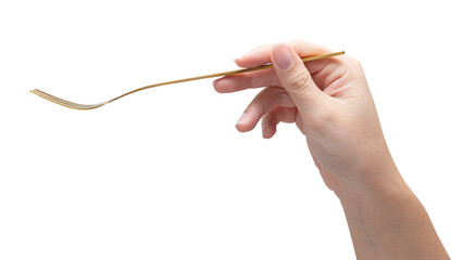 isolated of a woman's hand holding a golden fork.