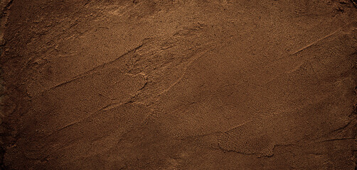 Dark chocolate brown sugar-like grainy texture background