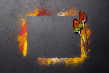 Wall Mural - Various spices on stone table