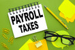 payroll taxes . Conceptual background with chart ,papers and pen