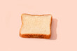 © Westend61 - Slice of bread over peach background