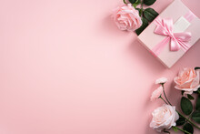Valentine's Day And Mother's Day Design Concept Background With Pink Flower And Gift On Pink Background.