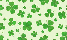 Seamless Pattern Of Three-leaf And Four-leaf Clover On A Light Green Background