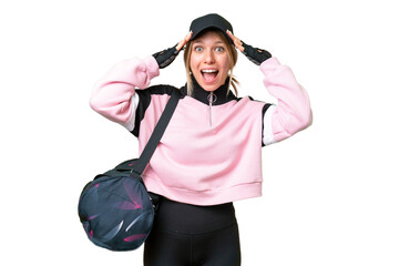 Wall Mural - Pretty sport woman with sport bag over isolated chroma key background with surprise expression