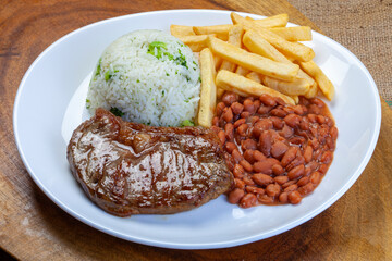 Wall Mural - Rice, beans, french fries and meat