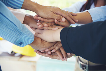 Wall Mural - Close up hands Diverse multiethnic Partners team together. Teamwork group of multi racial people meeting join hands. Diversity people hands join empower partnership teams connect volunteer community