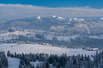 Wall Mural - Snow covered Carpathian mountains in winter. Tihuta Pass Piatra Fantanele Romania