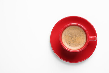 Poster - Red ceramic cup with hot aromatic coffee isolated on white, top view