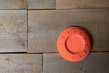 Wall Mural - orange clay target for shotgun practice, trap, skeet 