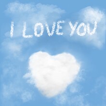 Puffy White Cloud Shaped Like A Heart On A Blue Sky With An I Love You Skywriting Message Above It