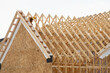 installation of rafters of a plywood house building wall studs wooden