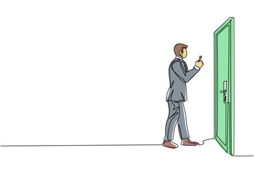 Poster - Continuous one line drawing businessman lifts key in front of door. Man holding key to open office room door. Starting morning with spirit to work. Single line draw design vector graphic illustration