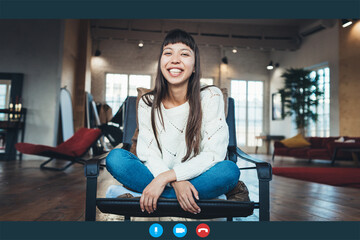 Wall Mural - Video call conference screen. Young and pretty asian woman working remote