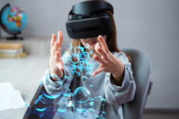 Wall Mural - schoolgirl is using virtual reality simulator headset for study. child is wearing virtual reality gl