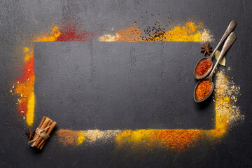 Wall Mural - Various spices on stone table