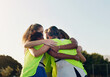 © Kobus L/peopleimages.com - Support, hug and team huddling for hockey, game motivation and sports on a field in Australia. Team building, planning and athlete girls with a circle huddle for teamwork, training and sport
