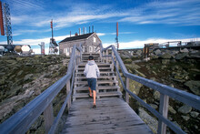 A Young Visitor On Top Of Mount Washington, The Highest Point In New Hampshire.